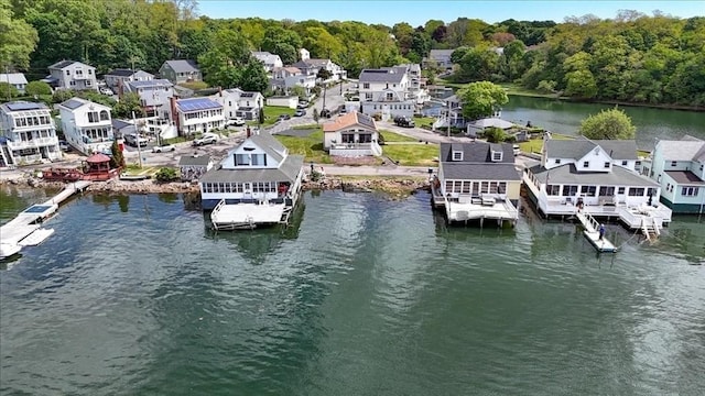1 Shore Ave, Beverly, MA 01915 - dock area featuring a water view, a residential view, boat lift, and a forest view