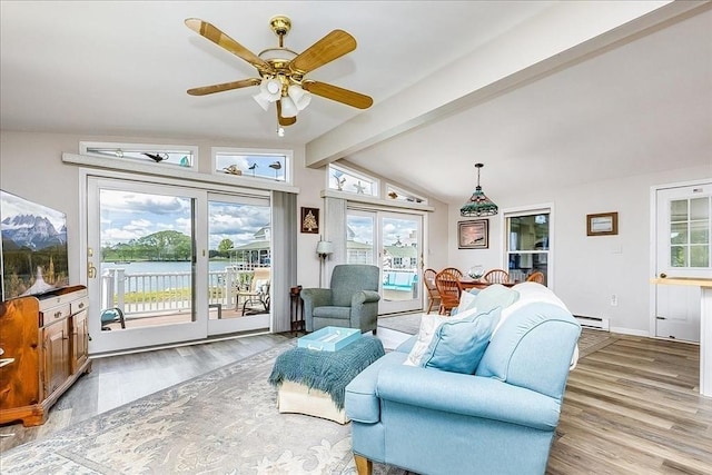 1 Shore Ave, Beverly, MA 01915 - living area with a baseboard heating unit, wood finished floors, a ceiling fan, and baseboards
