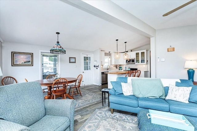 1 Shore Ave, Beverly, MA 01915 - living area featuring dark wood-type flooring, lofted ceiling, and a ceiling fan