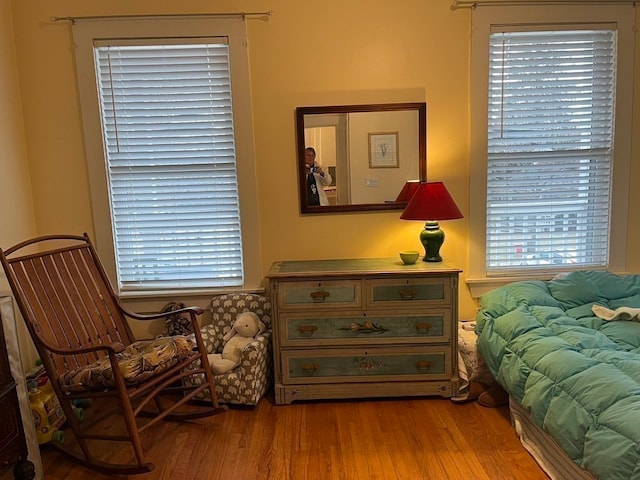 sitting room with light hardwood / wood-style floors