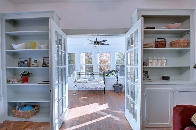 interior space featuring ceiling fan, light wood-type flooring, and french doors