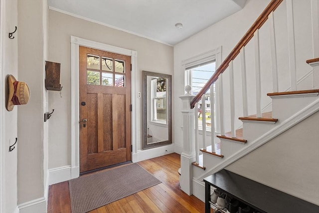 11 Draper Rd, Framingham, MA 01702 - entrance foyer featuring hardwood / wood-style floors and stairs