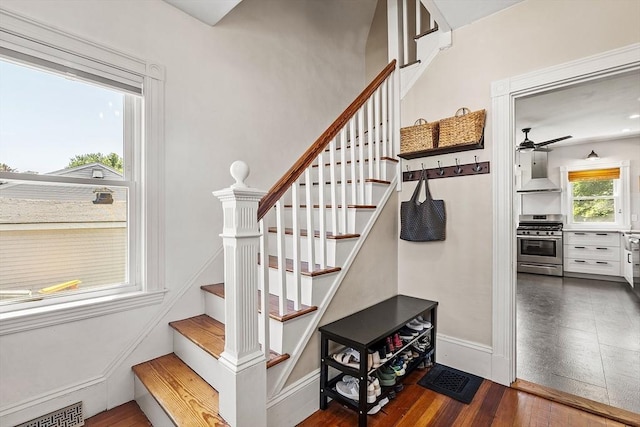 11 Draper Rd, Framingham, MA 01702 - stairway with wood finished floors and ceiling fan