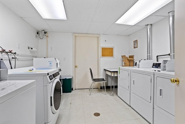 laundry room with washing machine and dryer