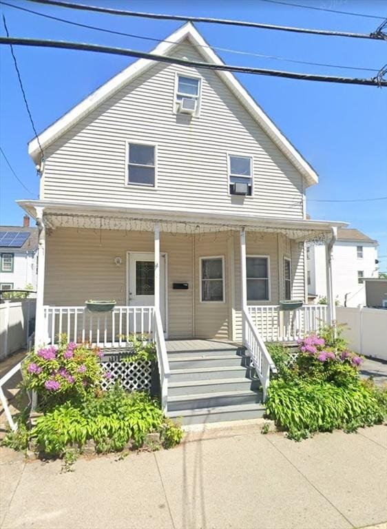 9 Cedar St, Lynn, MA 01905 - view of front of house featuring a porch and cooling unit