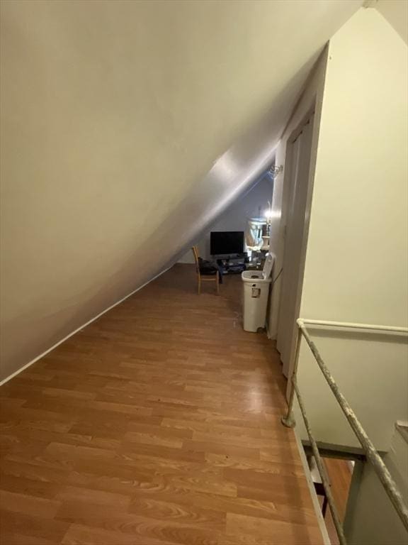 9 Cedar St, Lynn, MA 01905 - additional living space with lofted ceiling and light wood-style flooring