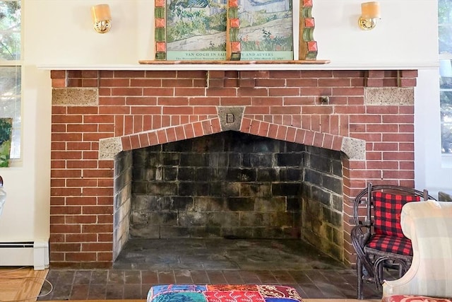 interior details featuring a baseboard heating unit