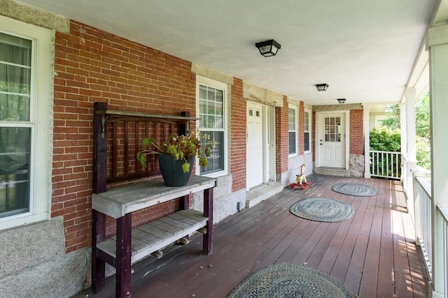 wooden terrace with covered porch