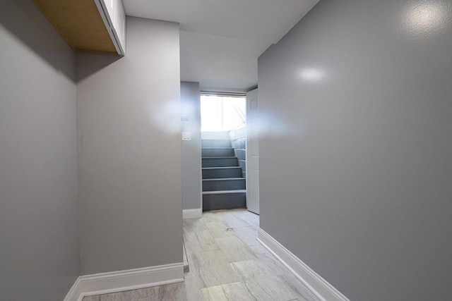 33 Altoona Rd, Dedham, MA 02026 - hallway with stairs, baseboards, and light wood-style flooring
