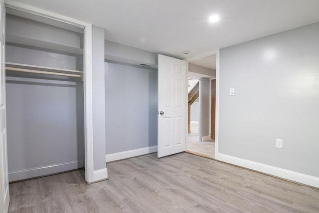 33 Altoona Rd, Dedham, MA 02026 - unfurnished bedroom with wood finished floors and baseboards
