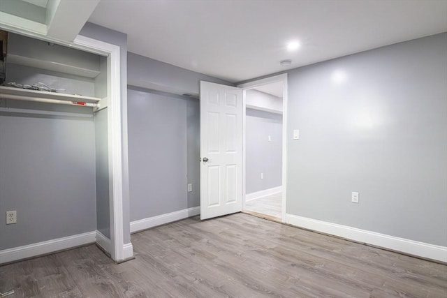 33 Altoona Rd, Dedham, MA 02026 - unfurnished bedroom with wood finished floors and baseboards