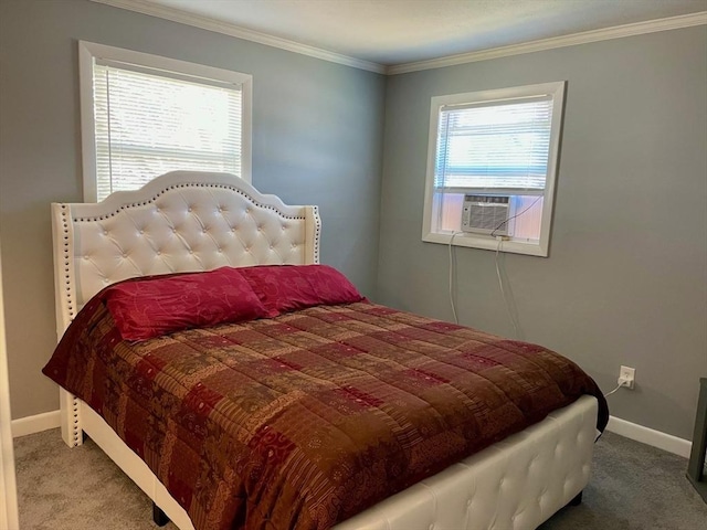 bedroom with cooling unit, carpet flooring, crown molding, and baseboards