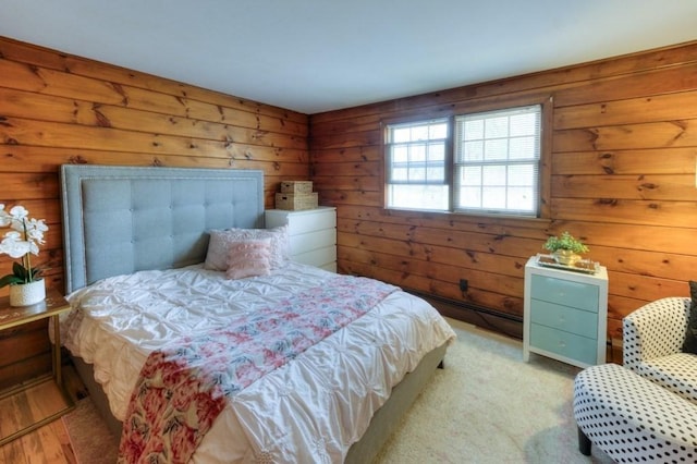 bedroom featuring wood walls