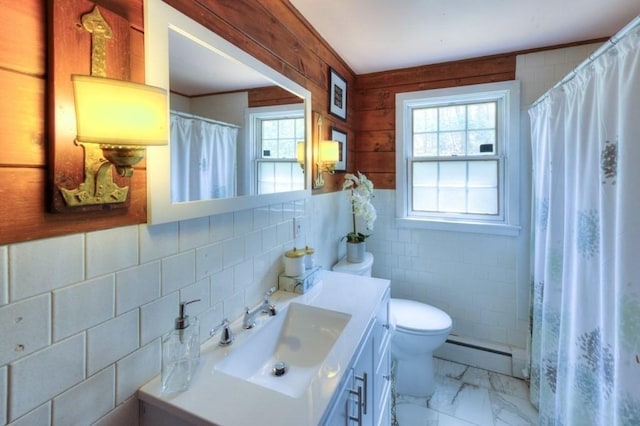full bathroom featuring plenty of natural light, a baseboard radiator, toilet, and marble finish floor