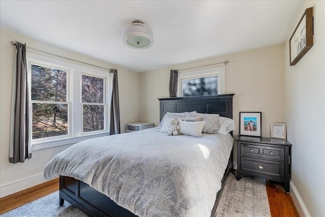 bedroom featuring dark hardwood / wood-style floors