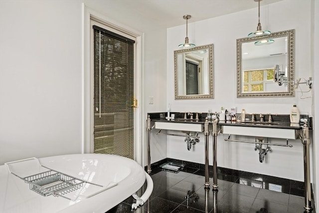 44 Southpoint Ln, Ipswich, MA 01938 - bathroom with granite floors and a freestanding tub