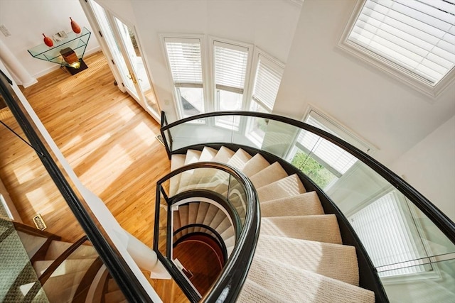 44 Southpoint Ln, Ipswich, MA 01938 - stairs featuring wood finished floors and a towering ceiling