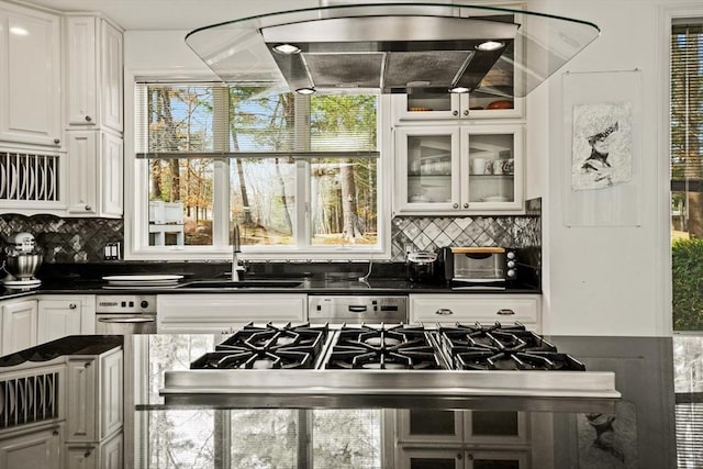 44 Southpoint Ln, Ipswich, MA 01938 - kitchen with dishwasher, dark countertops, decorative backsplash, and white cabinetry