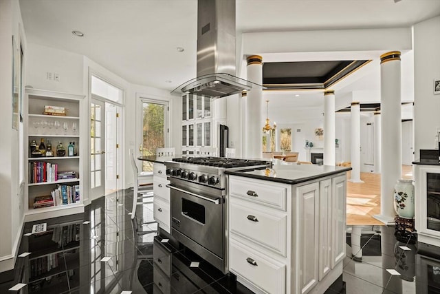 44 Southpoint Ln, Ipswich, MA 01938 - kitchen with island exhaust hood, high end stainless steel range, dark countertops, white cabinets, and recessed lighting