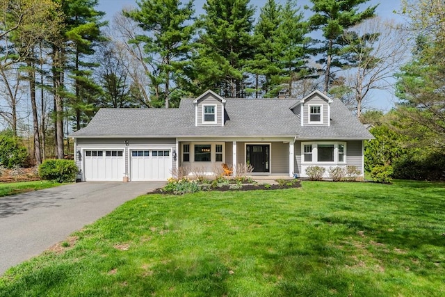 cape cod house featuring a porch, driveway, roof with shingles, a front yard, and a garage