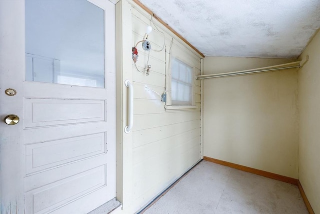 basement with a textured ceiling