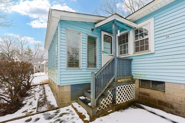 view of snow covered property