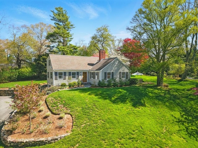 22 Partridge Rd, Duxbury, MA 02332 - view of front facade with a chimney and a front yard