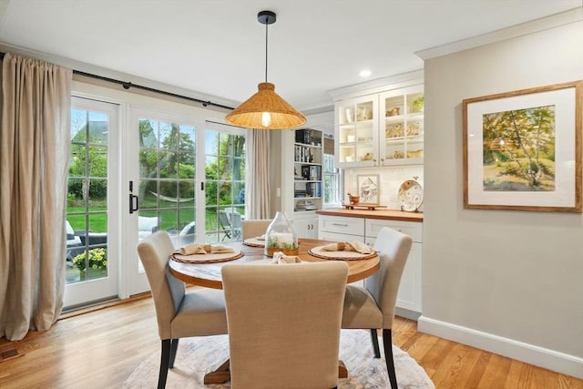 22 Partridge Rd, Duxbury, MA 02332 - dining area featuring light wood finished floors, baseboards, and recessed lighting
