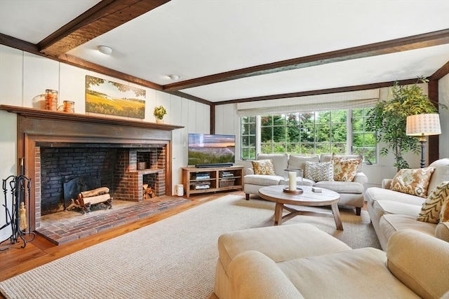 22 Partridge Rd, Duxbury, MA 02332 - living room with beam ceiling, wood finished floors, and a brick fireplace