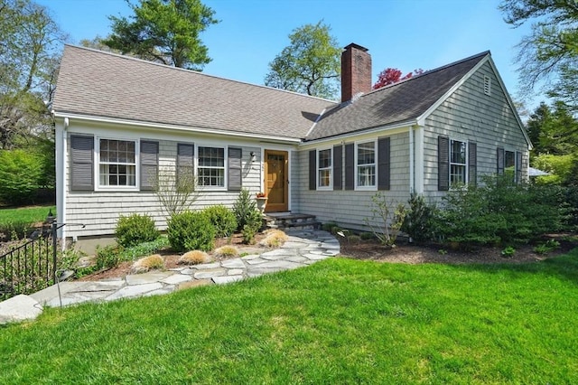 22 Partridge Rd, Duxbury, MA 02332 - view of front of home featuring a front yard, a chimney, and a shingled roof