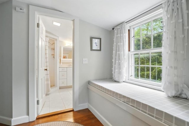 22 Partridge Rd, Duxbury, MA 02332 - entryway featuring plenty of natural light, baseboards, and light wood finished floors