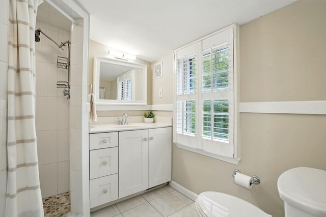 22 Partridge Rd, Duxbury, MA 02332 - bathroom with toilet, plenty of natural light, a tile shower, and tile patterned floors