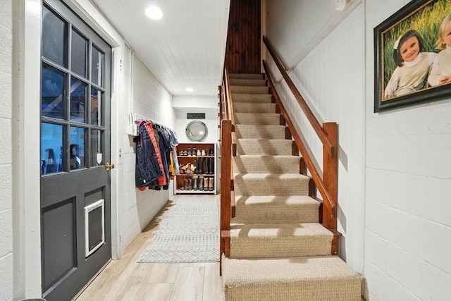 22 Partridge Rd, Duxbury, MA 02332 - stairway with wood finished floors, recessed lighting, and concrete block wall