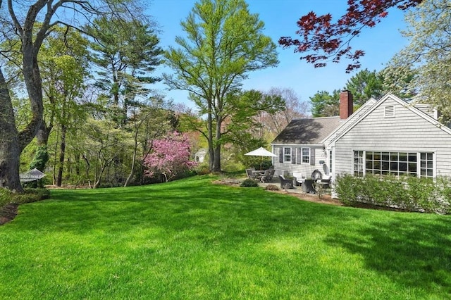 22 Partridge Rd, Duxbury, MA 02332 - back of house with a chimney and a lawn