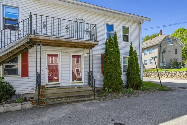 11 Broad St Unit 11, Hardwick, MA 01005 - view of front of house featuring entry steps and a balcony