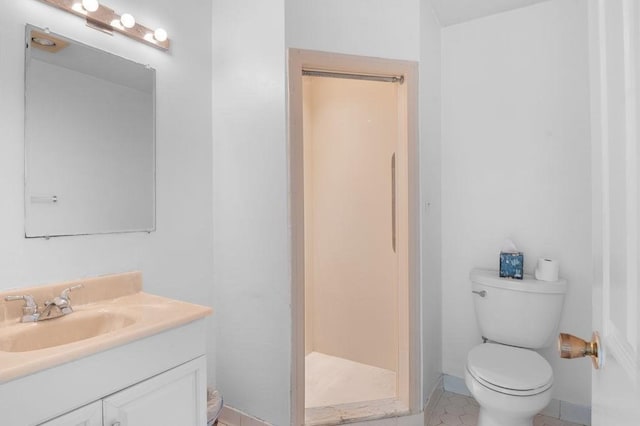 401 Colonial Dr Unit 35, Ipswich, MA 01938 - bathroom featuring toilet, vanity, and a shower stall