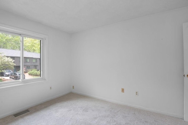 401 Colonial Dr Unit 35, Ipswich, MA 01938 - unfurnished room featuring light colored carpet and baseboards