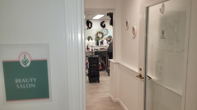 corridor featuring light wood-style floors