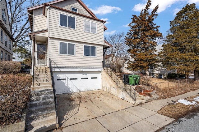 view of front of property featuring a garage