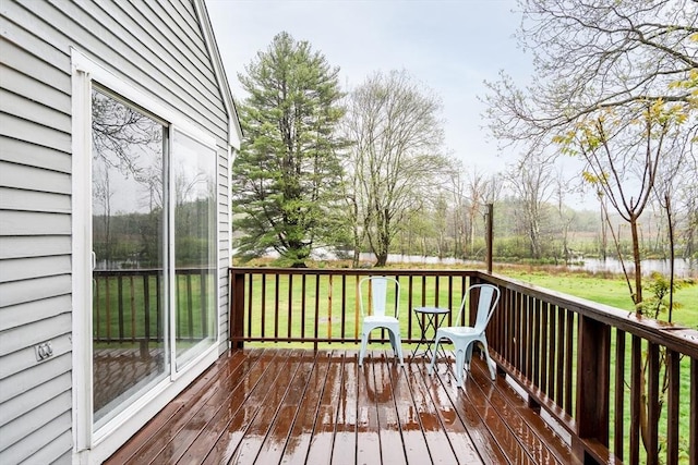 deck featuring a lawn