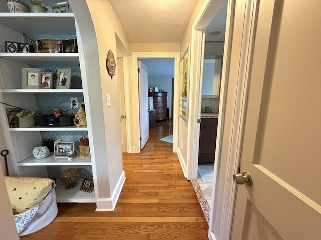 4 Perryville Rd, Webster, MA 01570 - hall featuring light wood-type flooring, a sink, and baseboards