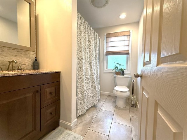 4 Perryville Rd, Webster, MA 01570 - bathroom with toilet, tasteful backsplash, vanity, baseboards, and tile patterned floors