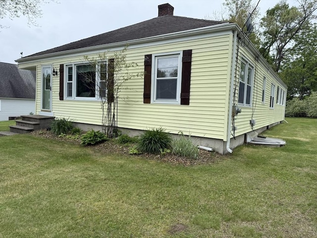 4 Perryville Rd, Webster, MA 01570 - view of property exterior featuring a chimney and a lawn