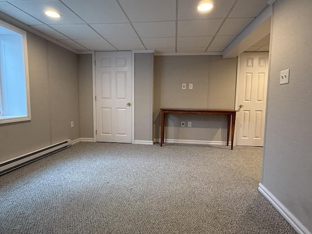 4 Perryville Rd, Webster, MA 01570 - finished basement featuring carpet flooring, a baseboard heating unit, baseboards, and a paneled ceiling