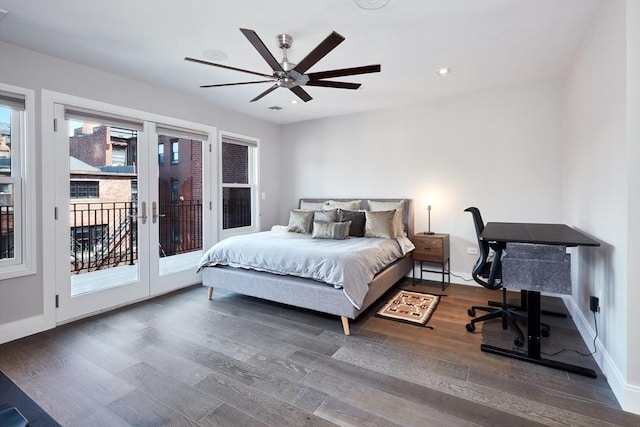 bedroom featuring dark hardwood / wood-style floors, access to exterior, ceiling fan, and french doors