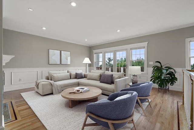 21 Musquashicut Ave Unit 27, Scituate, MA 02066 - living area with crown molding, recessed lighting, wainscoting, and light wood-style flooring