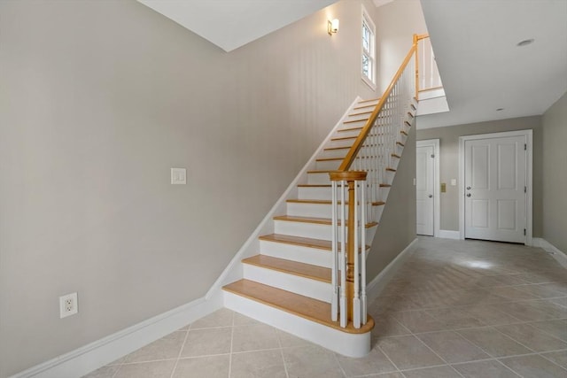 21 Musquashicut Ave Unit 27, Scituate, MA 02066 - stairs with tile patterned flooring and baseboards