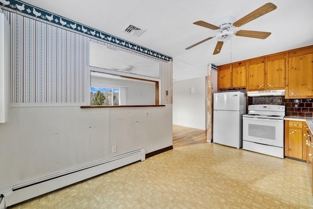 kitchen with baseboard heating, decorative backsplash, ceiling fan, and white appliances