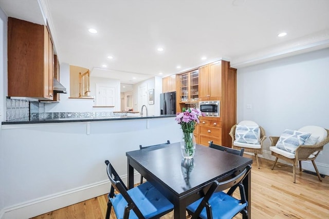 44 Dartmouth St Unit 1, Boston, MA 02116 - dining room featuring recessed lighting, baseboards, and light wood finished floors