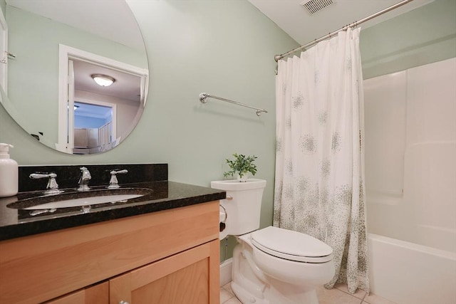 full bathroom with toilet, tile patterned flooring, vanity, and shower / bath combo with shower curtain